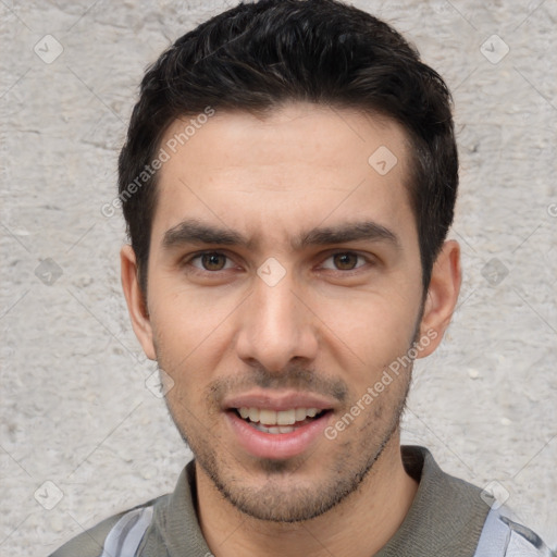 Joyful white young-adult male with short  black hair and brown eyes