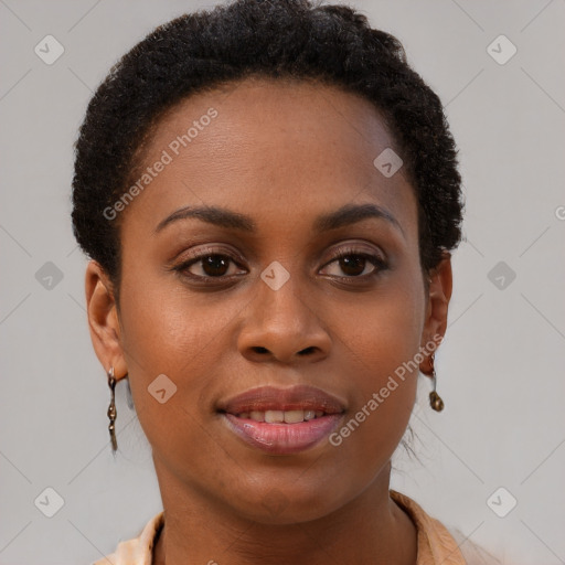 Joyful black young-adult female with short  brown hair and brown eyes