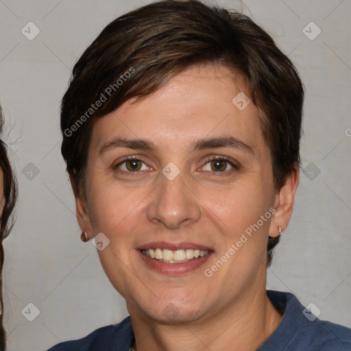 Joyful white adult female with medium  brown hair and brown eyes