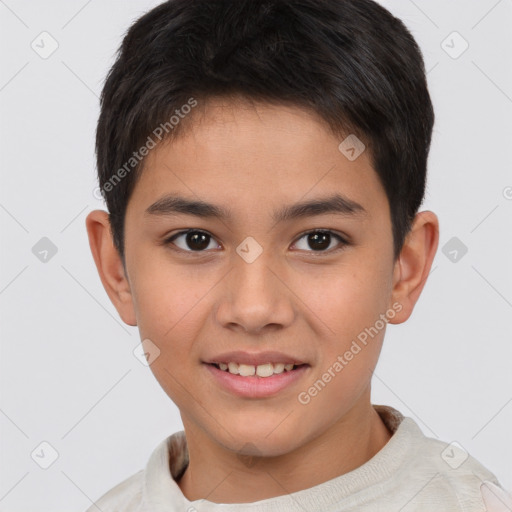 Joyful white child male with short  brown hair and brown eyes