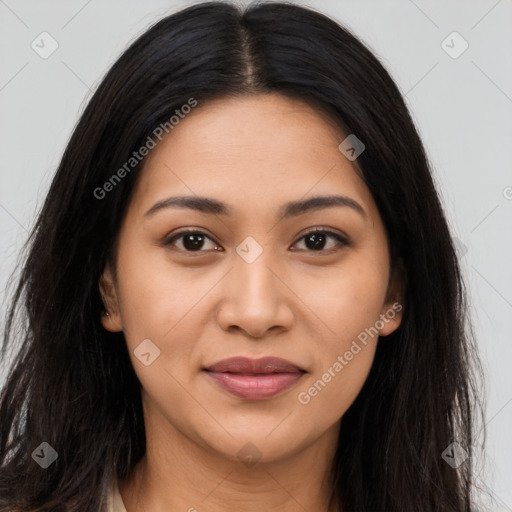 Joyful latino young-adult female with long  brown hair and brown eyes