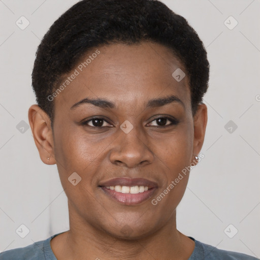 Joyful black young-adult female with short  brown hair and brown eyes