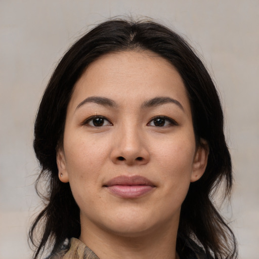 Joyful asian young-adult female with medium  brown hair and brown eyes