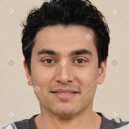 Joyful white young-adult male with short  black hair and brown eyes