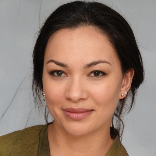 Joyful white young-adult female with medium  brown hair and brown eyes