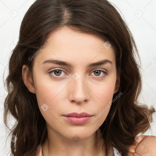 Neutral white young-adult female with long  brown hair and brown eyes