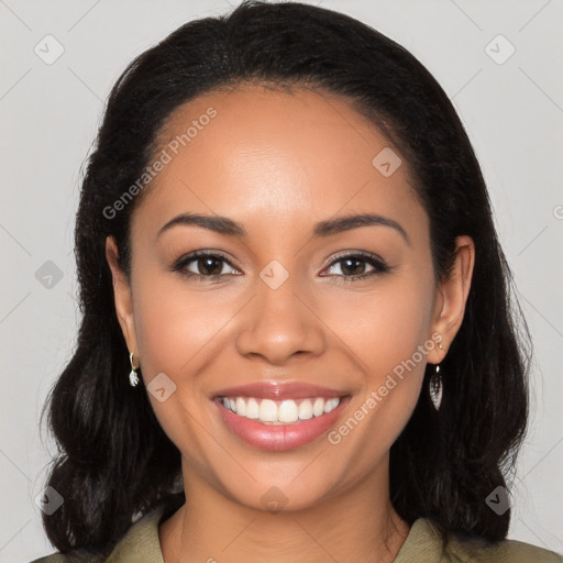 Joyful latino young-adult female with long  black hair and brown eyes