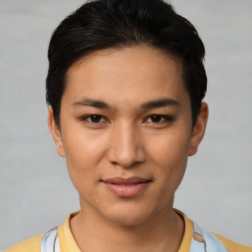 Joyful white young-adult female with short  black hair and brown eyes