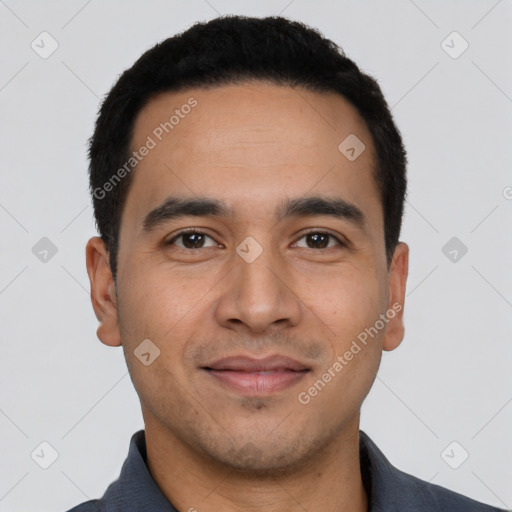 Joyful latino young-adult male with short  black hair and brown eyes