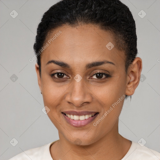 Joyful latino young-adult female with short  brown hair and brown eyes