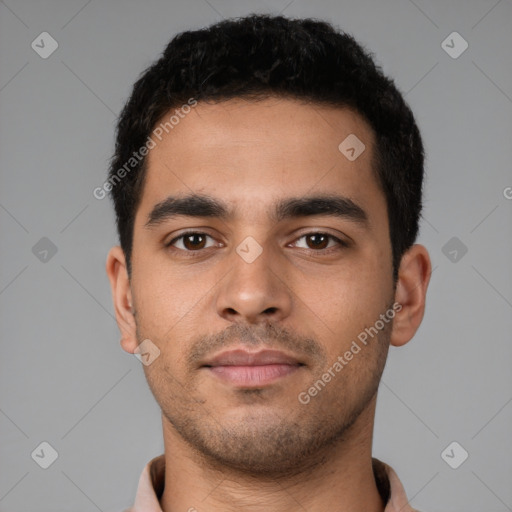 Neutral latino young-adult male with short  black hair and brown eyes