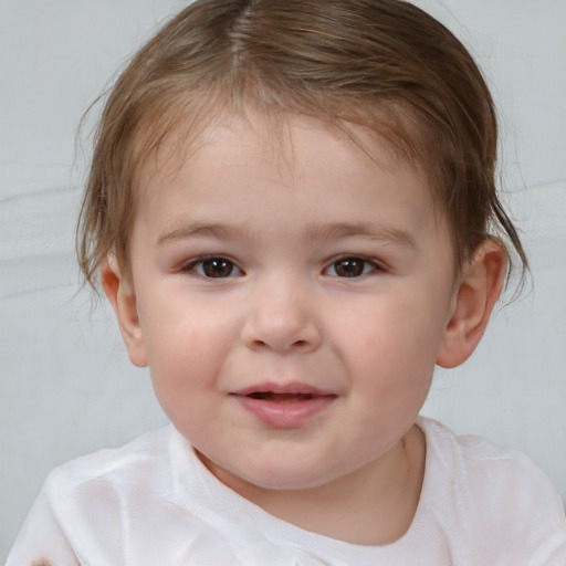 Joyful white child female with medium  brown hair and brown eyes