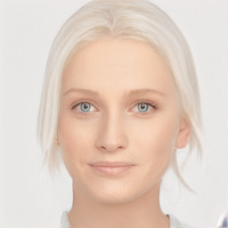 Joyful white young-adult female with medium  blond hair and blue eyes