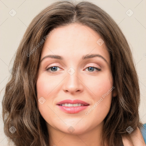 Joyful white young-adult female with long  brown hair and green eyes