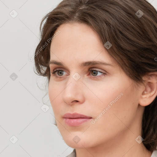 Neutral white young-adult female with medium  brown hair and grey eyes