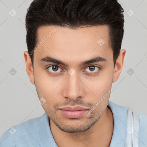 Neutral white young-adult male with short  brown hair and brown eyes