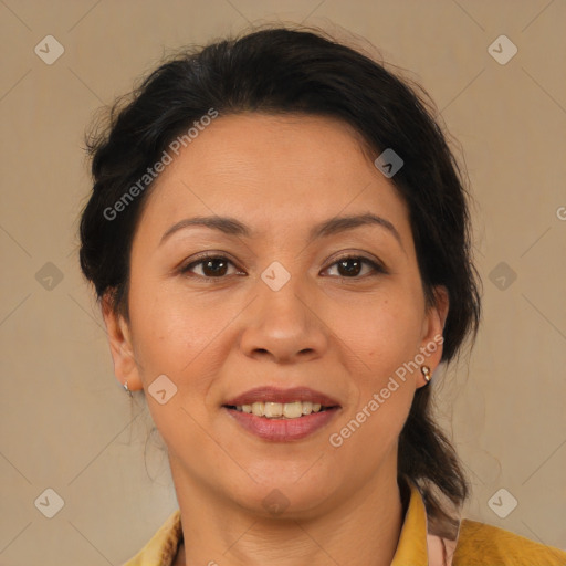 Joyful latino adult female with medium  brown hair and brown eyes