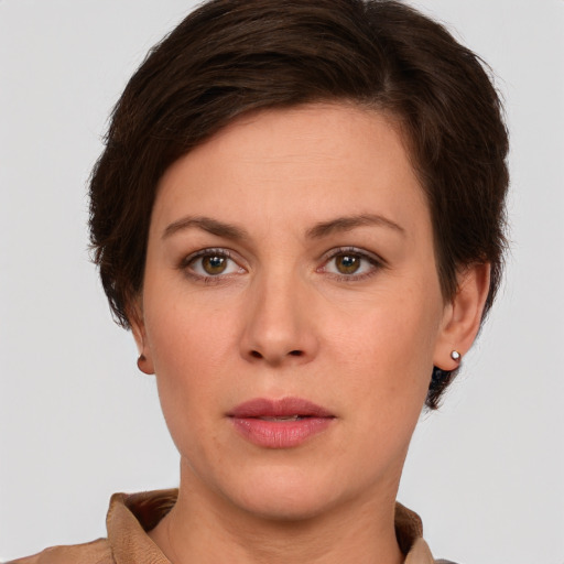 Neutral white young-adult female with short  brown hair and green eyes