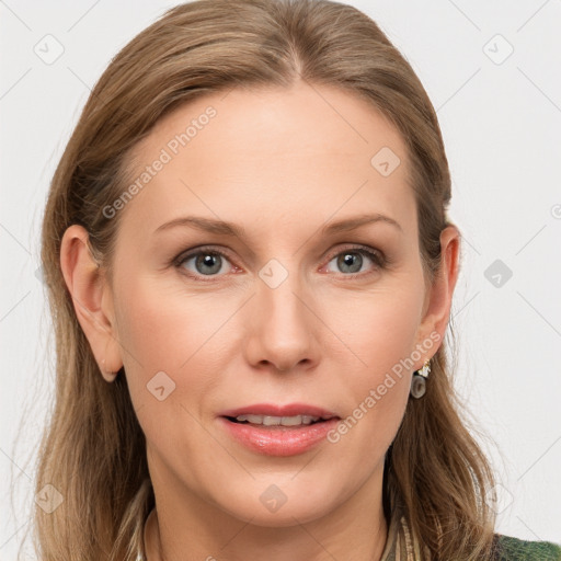 Joyful white young-adult female with medium  brown hair and blue eyes