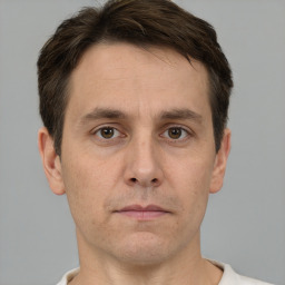 Neutral white adult male with short  brown hair and brown eyes