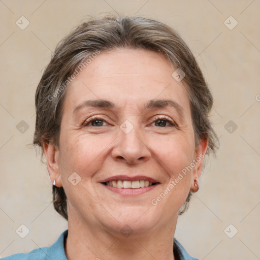 Joyful white adult female with short  brown hair and brown eyes