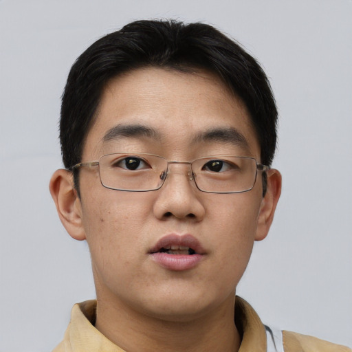 Neutral asian young-adult male with short  brown hair and brown eyes
