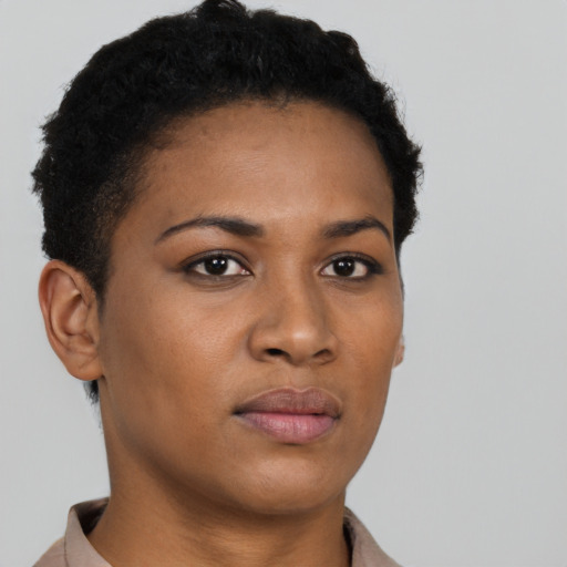 Neutral black young-adult female with short  brown hair and brown eyes