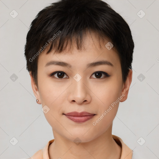 Joyful asian young-adult female with short  brown hair and brown eyes