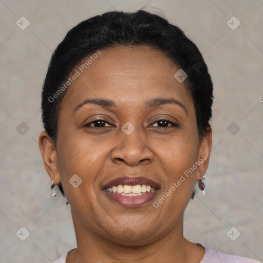 Joyful latino adult female with short  brown hair and brown eyes