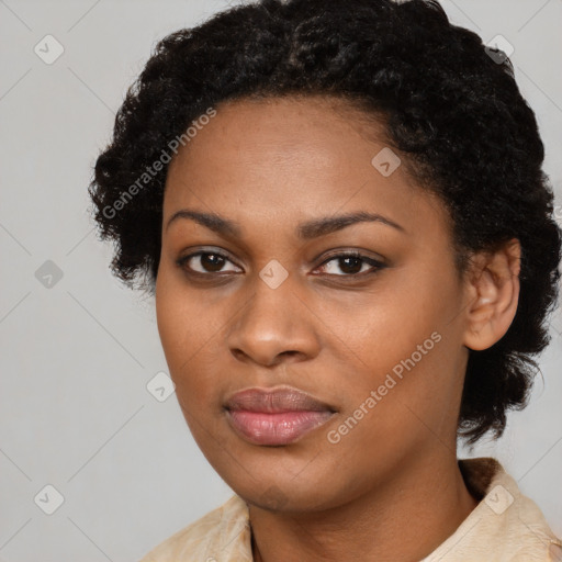 Joyful black young-adult female with medium  black hair and brown eyes