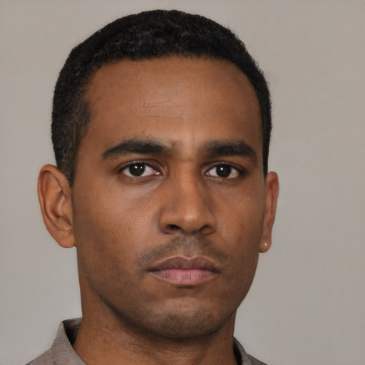Neutral latino young-adult male with short  brown hair and brown eyes
