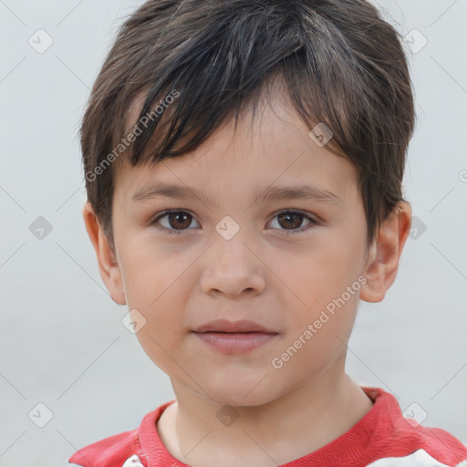 Joyful white child male with short  brown hair and brown eyes