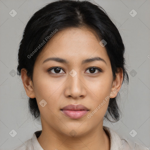 Joyful asian young-adult female with medium  black hair and brown eyes