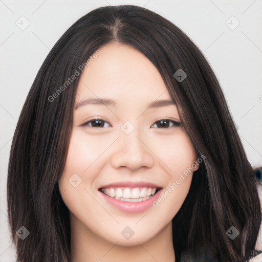 Joyful white young-adult female with long  black hair and brown eyes