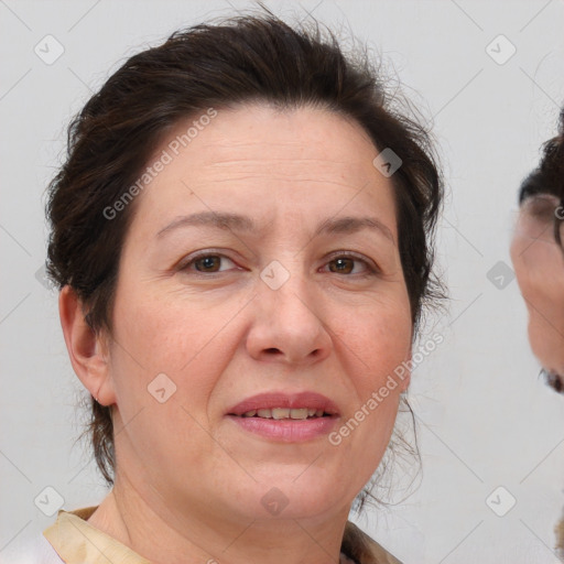 Joyful white adult female with short  brown hair and brown eyes