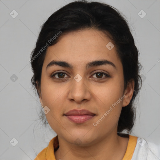 Joyful latino young-adult female with medium  brown hair and brown eyes