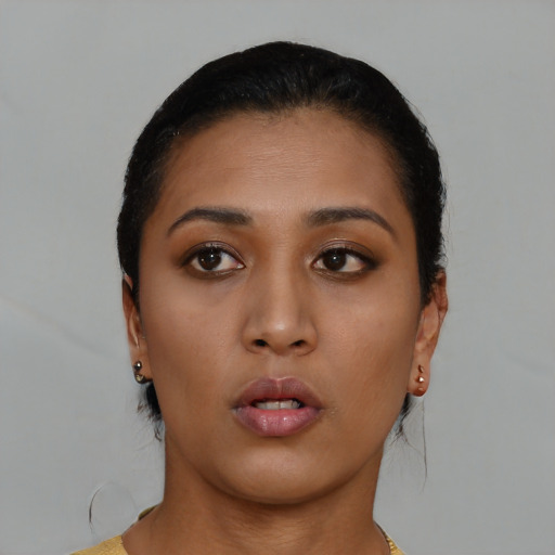 Neutral black young-adult female with short  brown hair and brown eyes