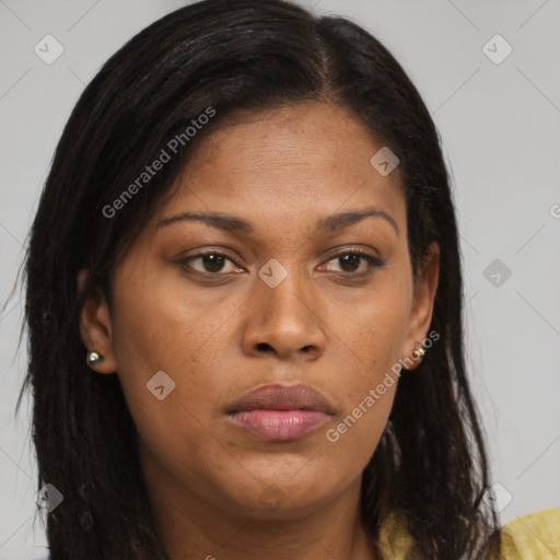 Joyful black young-adult female with long  brown hair and brown eyes