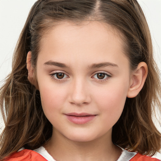 Joyful white child female with long  brown hair and brown eyes