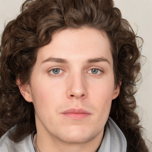 Neutral white young-adult male with medium  brown hair and brown eyes