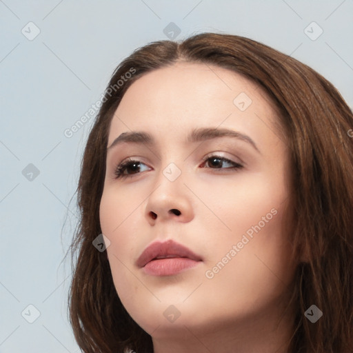 Neutral white young-adult female with long  brown hair and brown eyes