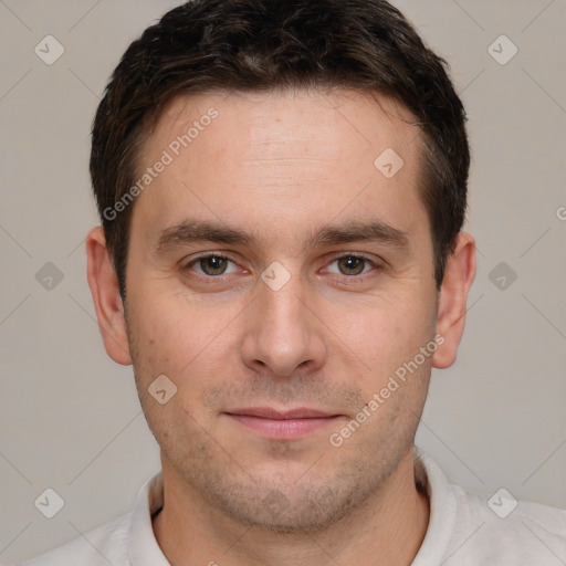 Joyful white young-adult male with short  brown hair and brown eyes