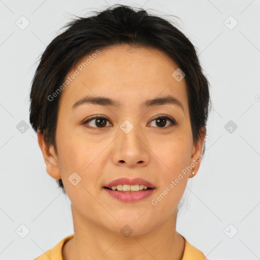 Joyful asian young-adult female with short  brown hair and brown eyes