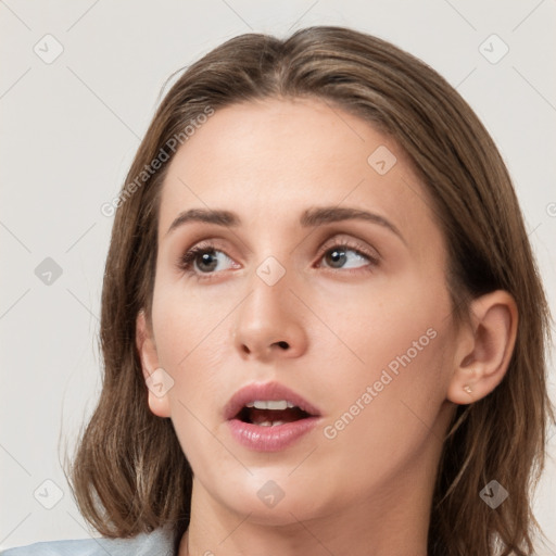 Neutral white young-adult female with medium  brown hair and grey eyes