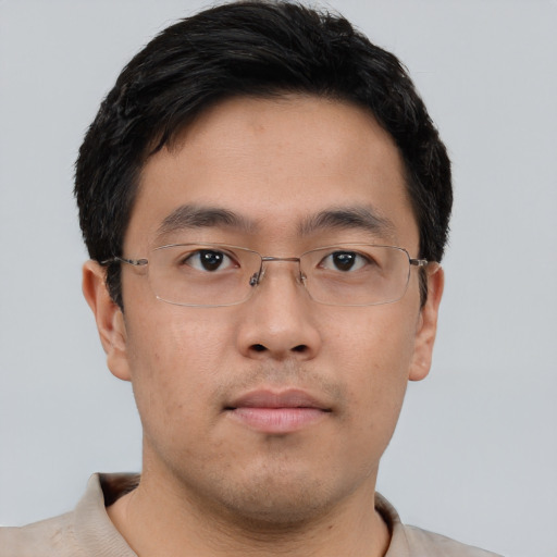 Neutral asian young-adult male with short  brown hair and brown eyes