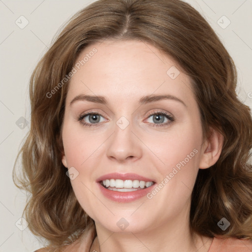 Joyful white young-adult female with medium  brown hair and green eyes