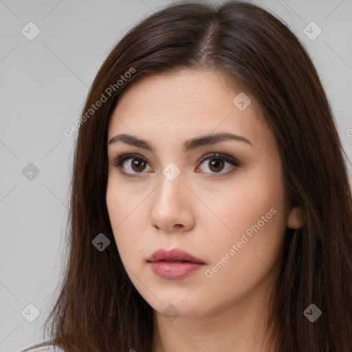 Neutral white young-adult female with long  brown hair and brown eyes