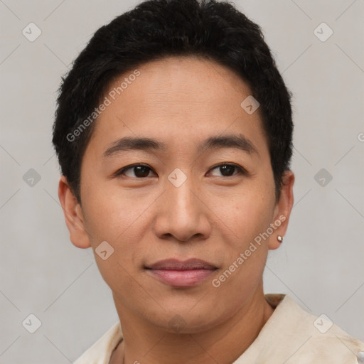 Joyful latino young-adult male with short  brown hair and brown eyes