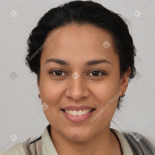 Joyful latino young-adult female with short  brown hair and brown eyes