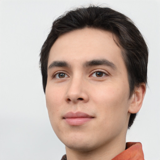 Neutral white young-adult male with short  black hair and brown eyes